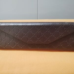 Gucci Brown Embossed Clutch